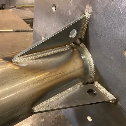Welded steel tube connection with two gusset plates