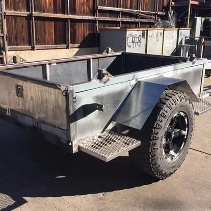 Custom steel utility trailer with off-road tire